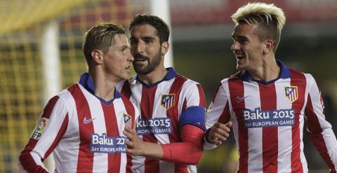 Fernando Torres, Raúl García y el francés Antoine Griezmann celebran el gol del Atlético ante el Villarreal. /EFE