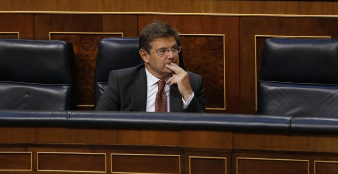 El ministro de Justicia, Rafael Catalá, durante el debate en pleno del Congreso de los Diputados de la moción del grupo socialista sobre su reprobación. EFE/Paco Campos