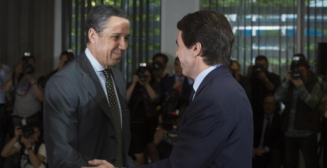 Eduardo Zaplana y José María Aznar.