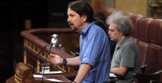 El líder de Podemos, Pablo Iglesias, durante su intervención en el pleno del Congreso ante el que comparece el jefe del Ejecutivo, Pedro Sánchez, para informar de la posición que trasladará al primer Consejo Europeo al que asiste como jefe del Ejecutivo y