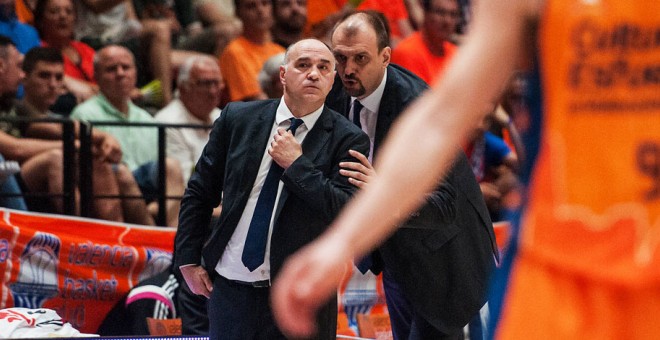 Tabak, con Pablo Laso durante su etapa de asistente en el Real Madrid.