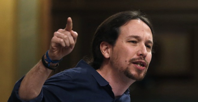 El líder de Podemos, Pablo Iglesias, durante su intervención hoy en el Congreso de los Diputados para responder al presidente del Gobierno en funciones, Mariano Rajoy.- EFE