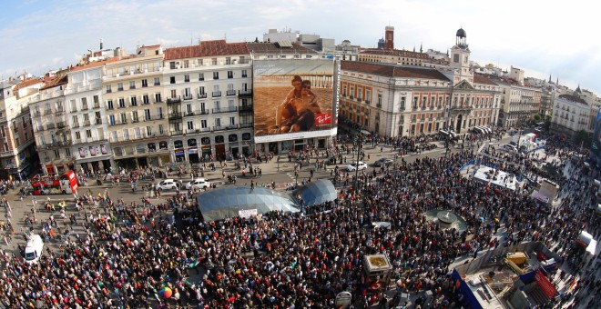 People fill Puerta del Sol square during a march to mark the 5th anniversary of the 'indignados' movement in Madrid, Spain, May 15, 2016. Picture taken with an eye fish lens. REUTERS/Sergio Perez