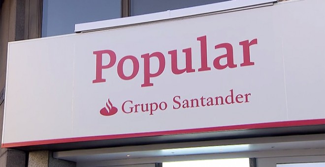 Los rótulos de las más de 1.200 oficinas de los bancos Popular y Pastor comienzan estos días a mostrar el color corporativo y la marca del Grupo Santander, su dueño desde junio.