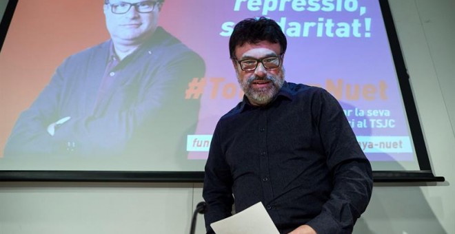 El coordinador general d'EUiA i diputat de Catalunya en Comú Podem, Joan Josep Nuet, durant la roda de premsa oferta al Col·legi de Periodistes de Barcelona en motiu de la presentació d'una campanya de suport per sufragar la seva defensa al judici de l'1-