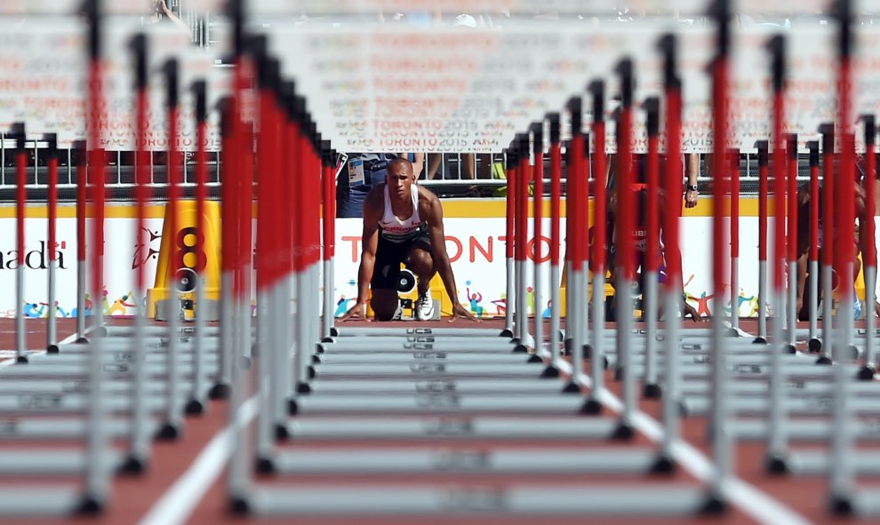 El atleta Damian Warner, de Canadá, en los Juegos Panamericanos de Toronto 2015 en Toronto, Canadá 23 de julio de 2015. AFP PHOTO / TIMOTHY A. CLARY