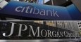 Los logos de Citibank y de JP Morgan en sus sedes en Nueva York. REUTERS