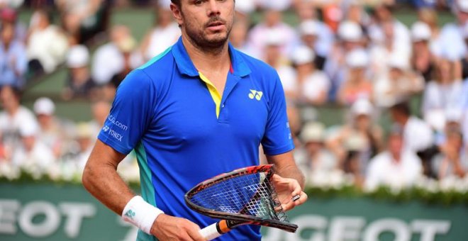 Stanislas Wawrinka tras romper su raqueta en la final de Roland Garros ante el español Rafael Nadal. EFE/Caroline Blumberg