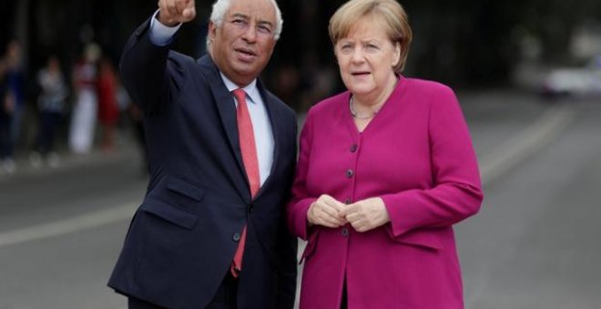 Antonio Costa y Angela Merkel - REUTERS