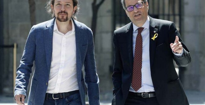 El presidente catalán, Quim Torra, y el secretario general de Podemos, Pablo Iglesias, se han visto en Barcelona. (ANDREU DALMAU | EFE)