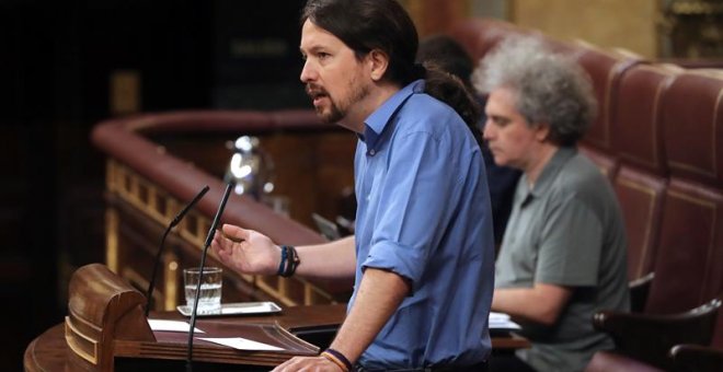 El líder de Podemos, Pablo Iglesias, durante su intervención en el pleno del Congreso ante el que comparece el jefe del Ejecutivo, Pedro Sánchez, para informar de la posición que trasladará al primer Consejo Europeo al que asiste como jefe del Ejecutivo y