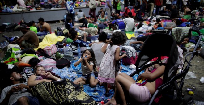 Algunos de los miles de migrantes hondureños descansando en la ciudad mexicana de Tapachula - REUTERS/Ueslei Marcelino