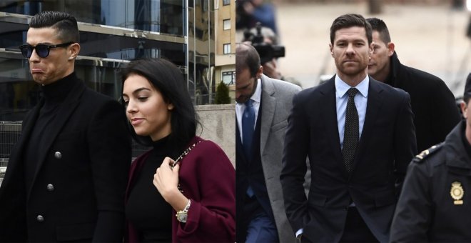 Cristiano Ronaldo y Xabi Alonso ante la audiencia judicial por evasión fiscal en Madrid el 22 de enero de 2019 | AFP