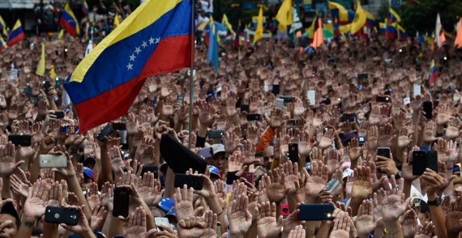 Mitin de oposición contra Nicolás Maduro en el que el presidente de la Asamblea Nacional de Venezuela, Juan Guaido, se declaró a sí mismo presidente interino del país | AFP