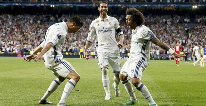 Cristiano Ronaldo celebra un gol, durante su etapa en el Real Madrid, junto Marcelo y Sergio Ramos. / EFE