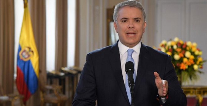 Fotografía cedida por la Presidencia de Colombia que muestra al mandatario colombiano Iván Duque durante una declaración al país este jueves, en Bogotá.-EFE