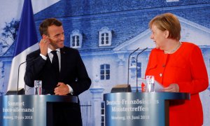 La canciller alemana, Angela Merkel, y el presidente francés, Emmanuel Macron. / REUTERS