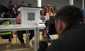 Votants en un col·legi de l'1-O. AFP