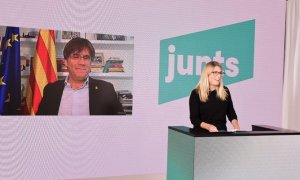 Elsa Artadi durant la cloenda del Congrés fundacional de Junts amb el president Puigdemont a la pantalla esperant per intervenir.JUNTS