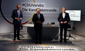 Los candidatos a liderar la CDU en Alemania, Friedrich Merz, Norbert Roettgen and Armin Laschet, en un debate televisado en la sede del partido en Berlín.