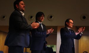 Junqueras, Puigdemont i Mas en una imatge d'arxiu, d'un acte del 2016.