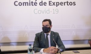 El presidente de la Junta de Andalucía, Juanma Moreno, durante la reunión Consejo Asesor de Alertas de Salud Pública de Alto Impacto.