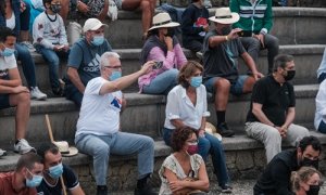 El exjuez Baltasar Garzón y la fiscal general del Estado, Dolores Delgado, en las fiestas de la Rapa das Bestas de Saucedo, en A Estrada, a 28 de agosto de 2021, en Pontevedra,