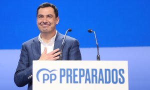 El presidente del PP en Andalucía y presidente de la Junta de Andalucía, Juanma Moreno, durante su intervención en el segundo y último día del congreso del PP .