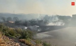 Imágenes de los servicios de emergencias en el incendio de Aranjuez (Madrid).