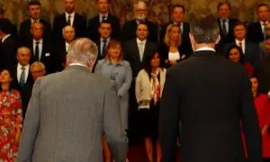 El rey emérito Juan Carlos I, junto a su hijo, el rey Felipe VI, durante un acto en 2019.