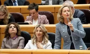 La vicepresidenta primera y ministra de Economía, Comercio y Empresa, Nadia Calviño, interviene durante una sesión plenaria, en el Senado el pasado 12 de diciembre. Junto a ella, la vicepresidenta segunda, Yolanda Díaz, y la cuarta, María Jesús Montero.