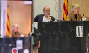 El conseller Campuzano i la directora general de l'Autonomia Personal i la Discapacitat, Marta Segura i Bonet, durant la presentació del web