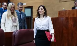 La presidenta de la Comunidad de Madrid, Isabel Díaz Ayuso, a su llegada a una sesión plenaria en la Asamblea de Madrid, a 14 de marzo de 2024, en Madrid (España).