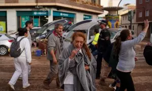 Una de las mujeres afectadas por las inundaciones de la DANA en el barrio de La Torre de València.