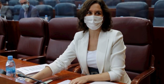 Ayuso aprueba una ley que favorece la "especulación urbanística" entre denuncias de la oposición de "fraude" en la votación