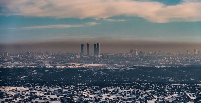 La boina de Madrid, en imágenes