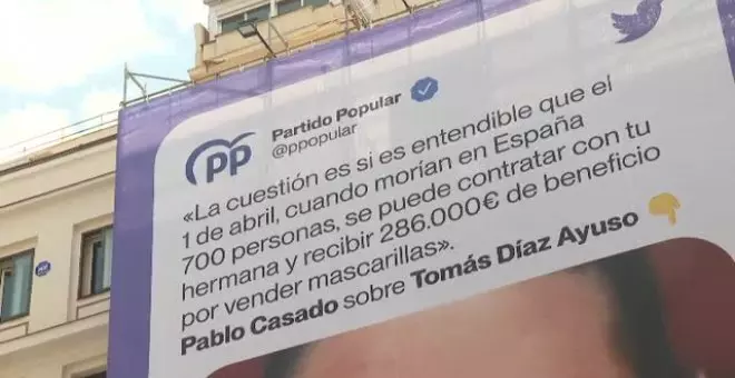 Podemos coloca un cartel de campaña con el rostro del hermano de Díaz Ayuso en pleno barrio madrileño de Salamanca