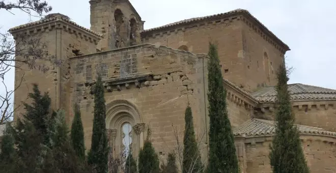 Un monumento nacional a la sombra de un parque eólico